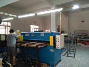 Cutting natural rubber material